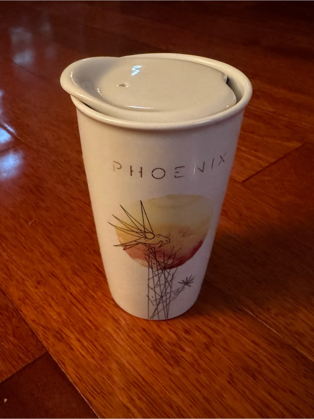 Starbucks Phoenix Ceramic Travel Cup in White with Yellow-Orange Accent